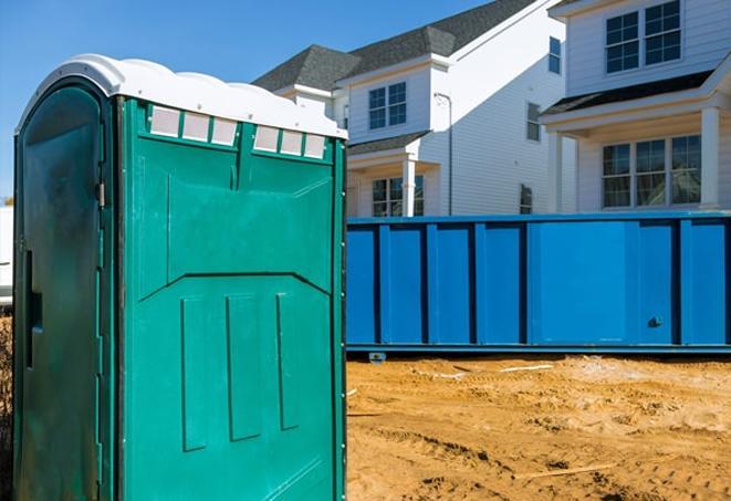 a sea of portable toilets at a construction site